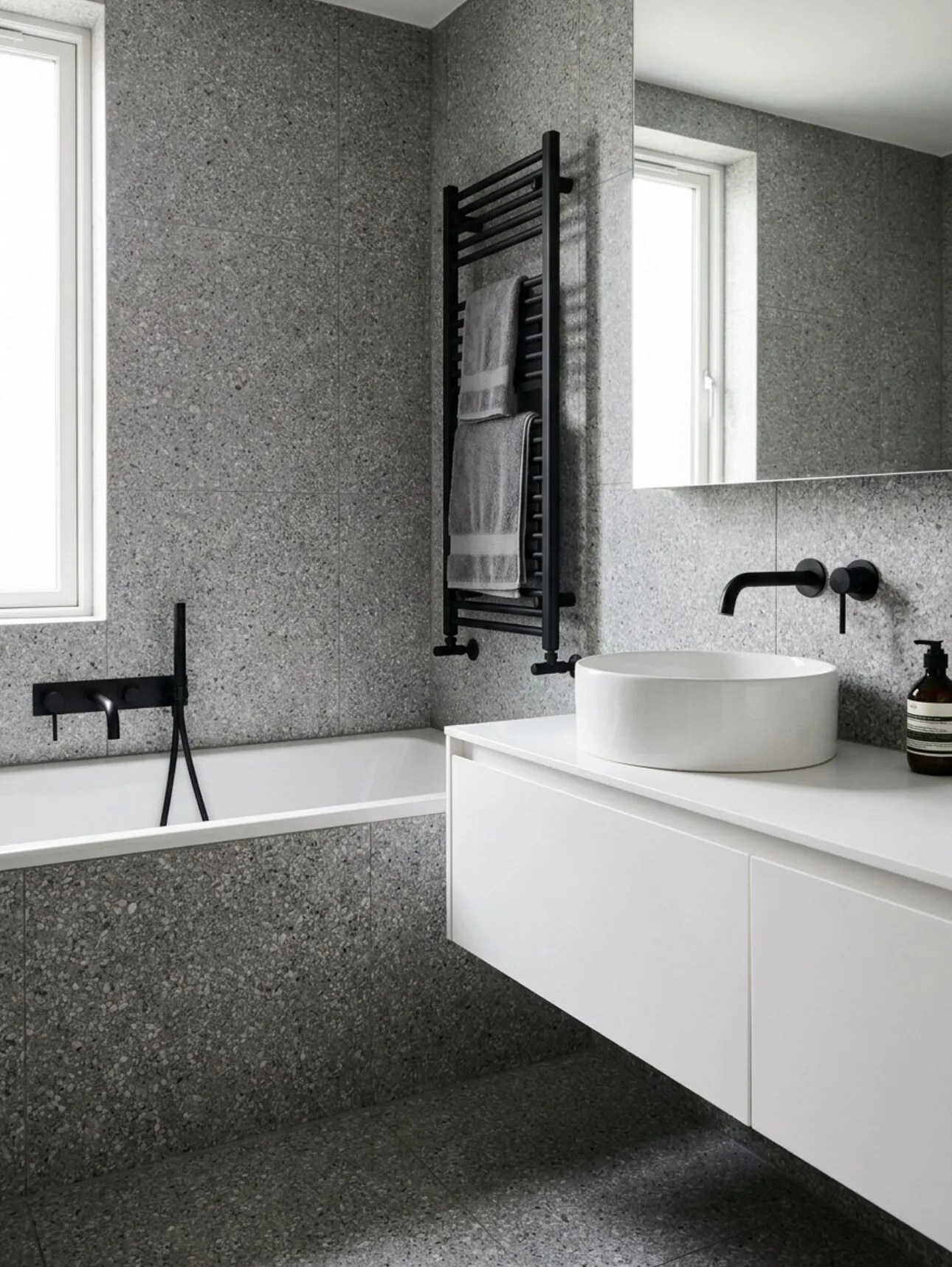 Bath, vanity and matt black radiator